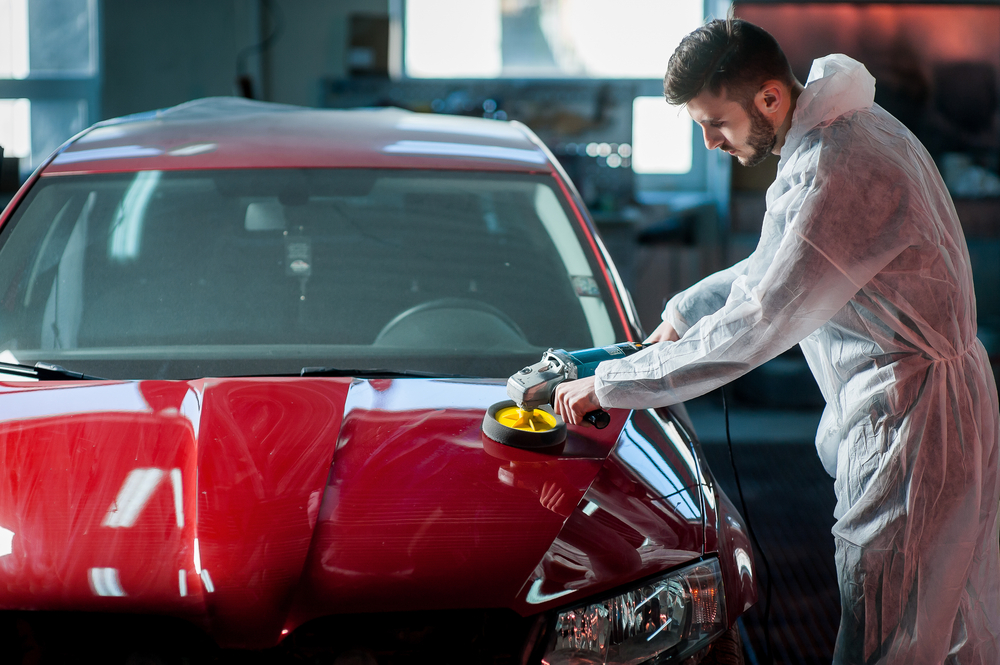 man waxing a car professional car detailing experts