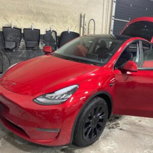 red tesla detailing service